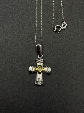 Two tone gold Cross